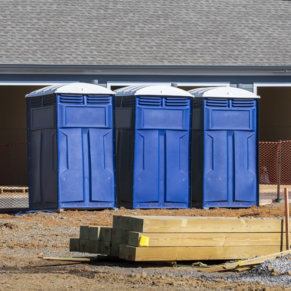 what is the cost difference between standard and deluxe portable restroom rentals in Pattison